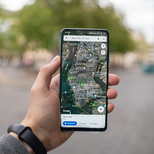 person holding white samsung android smartphone